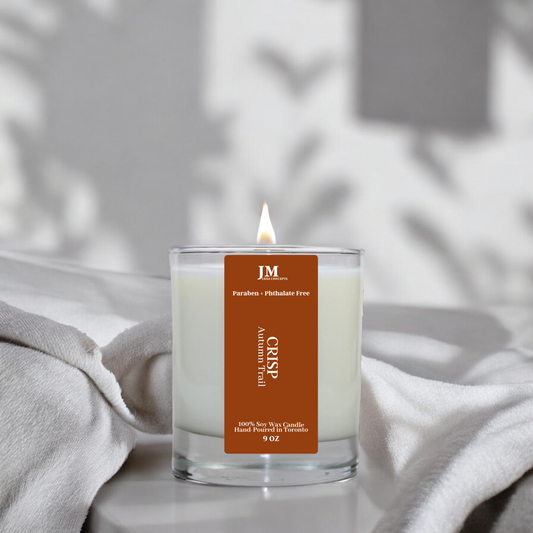 Autumn Trail scented soy candle in a sleek glass jar, emitting a warm and earthy fragrance with notes of cedarwood, amber, and crisp autumn leaves. Ideal for adding a cozy, fall-inspired ambiance to your home.